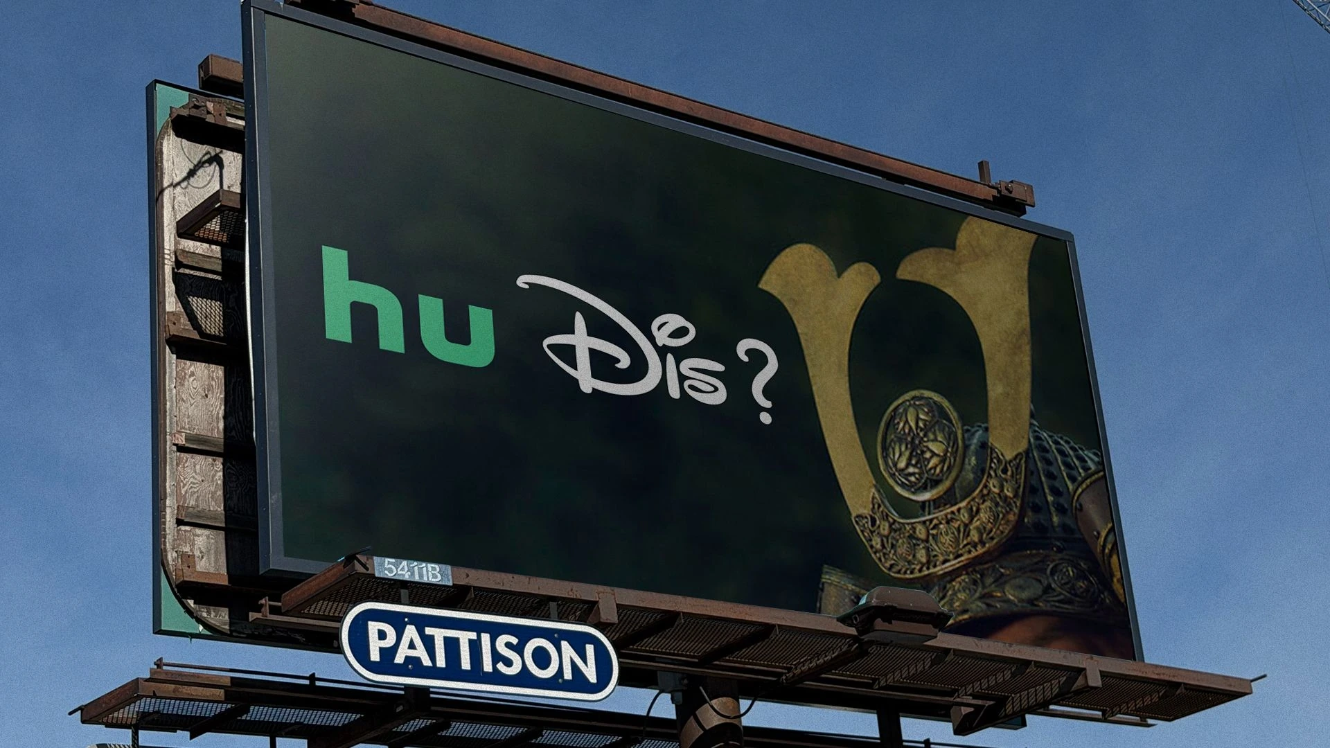 Billboard de Hulu y Disney+ con el mensaje Hu Dis y una imagen parcial de un personaje con vestuario de fantasía.