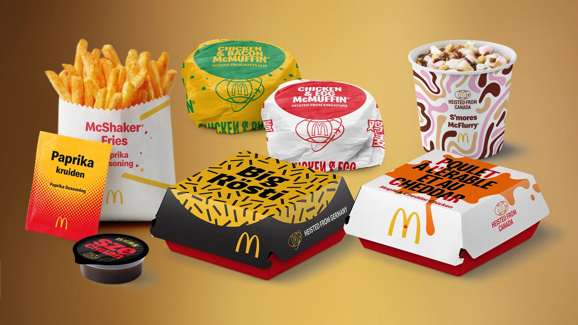 Selección de productos y empaques de McDonald’s World Menu Heist, incluyendo papas sazonadas, McFlurry, McMuffins y cajas de hamburguesas internacionales.