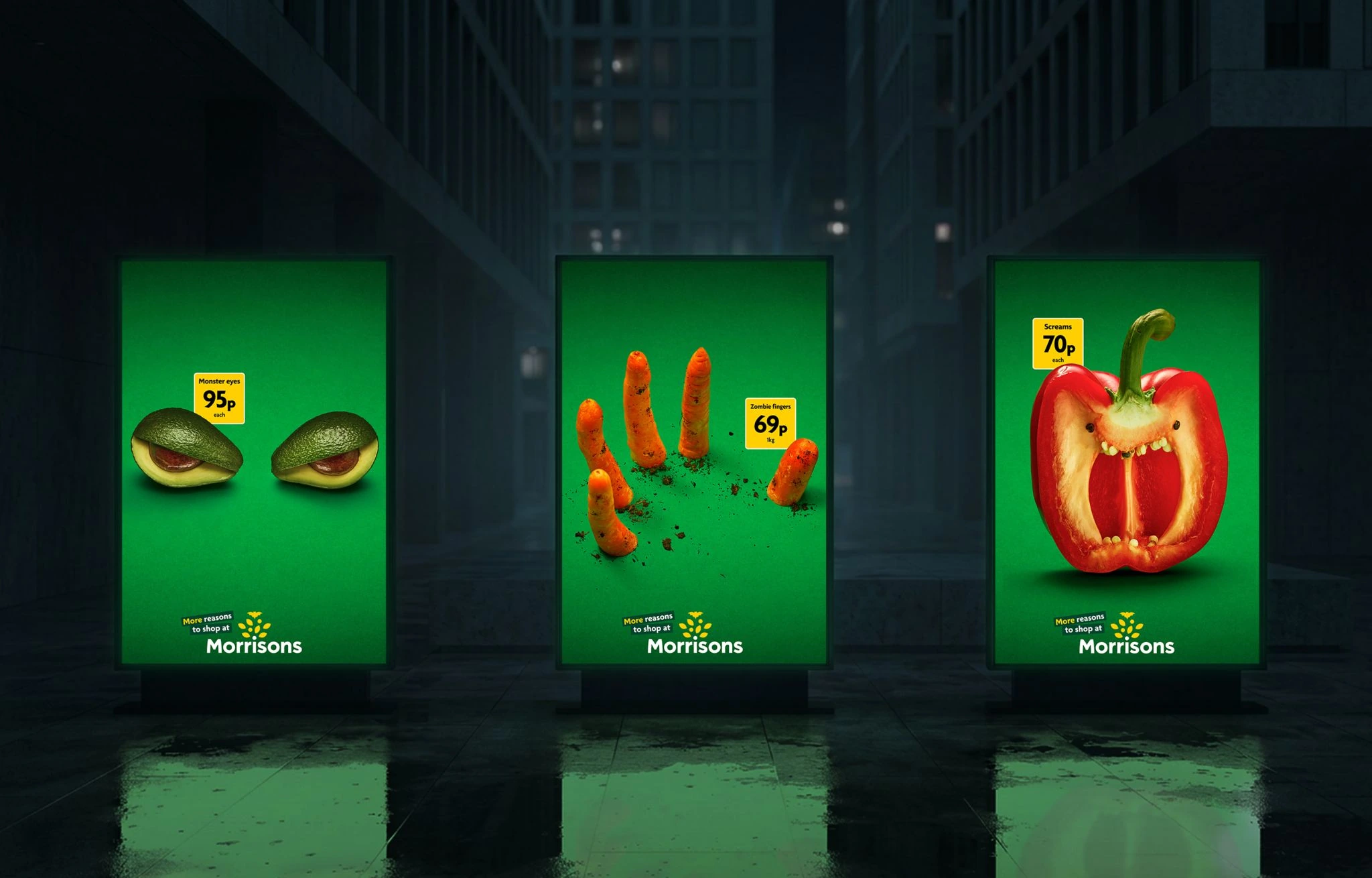Tres piezas OOH de Morrisons para Halloween mostrando aguacates como ojos, zanahorias como dedos de zombie y un pimiento rojo que grita.